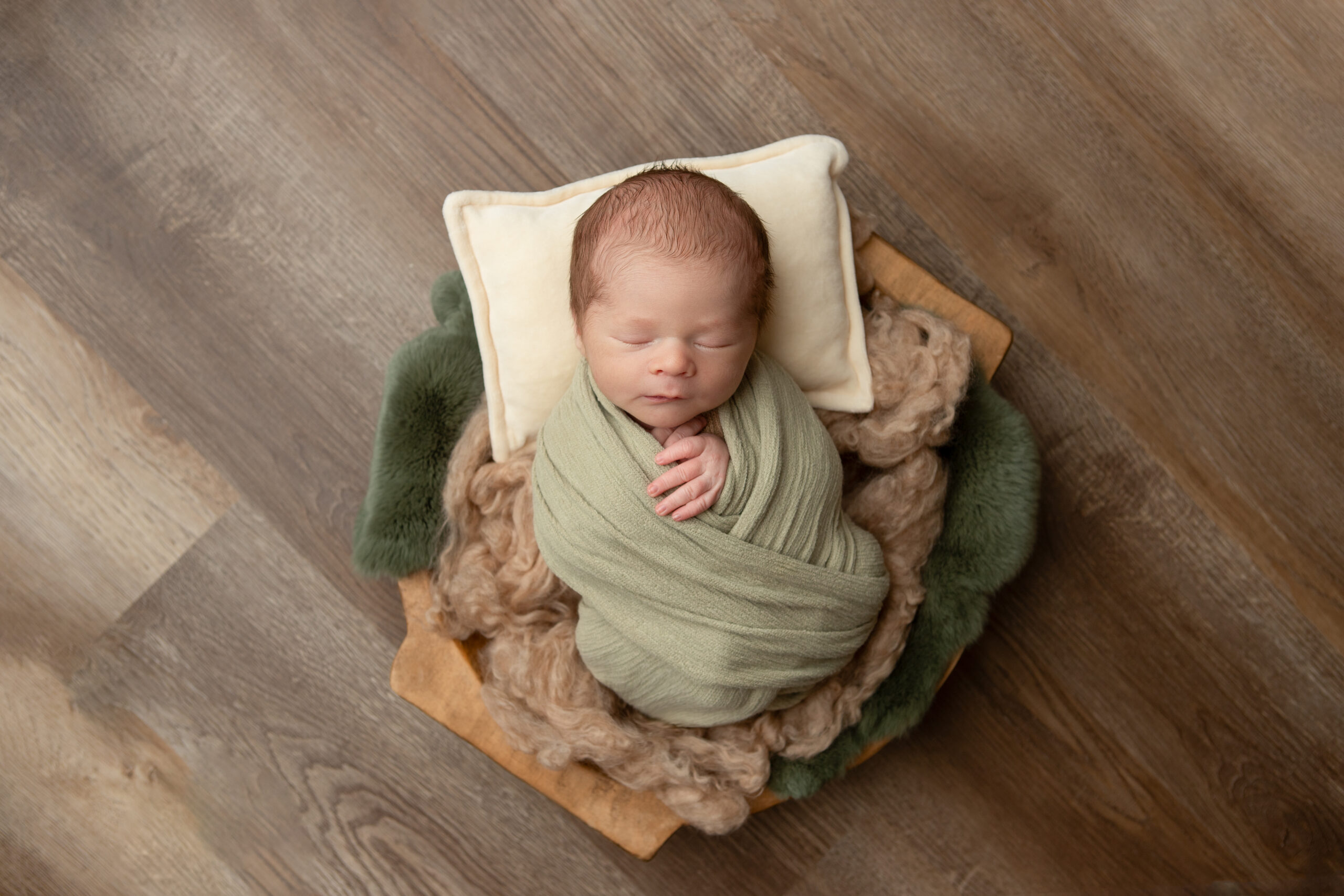 Edmonton Newborn baby in a wooden bowl